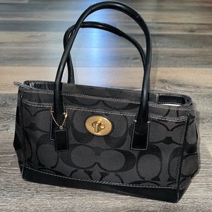 Signature Coach black shoulder bag with gold hardware (includes matching wallet)